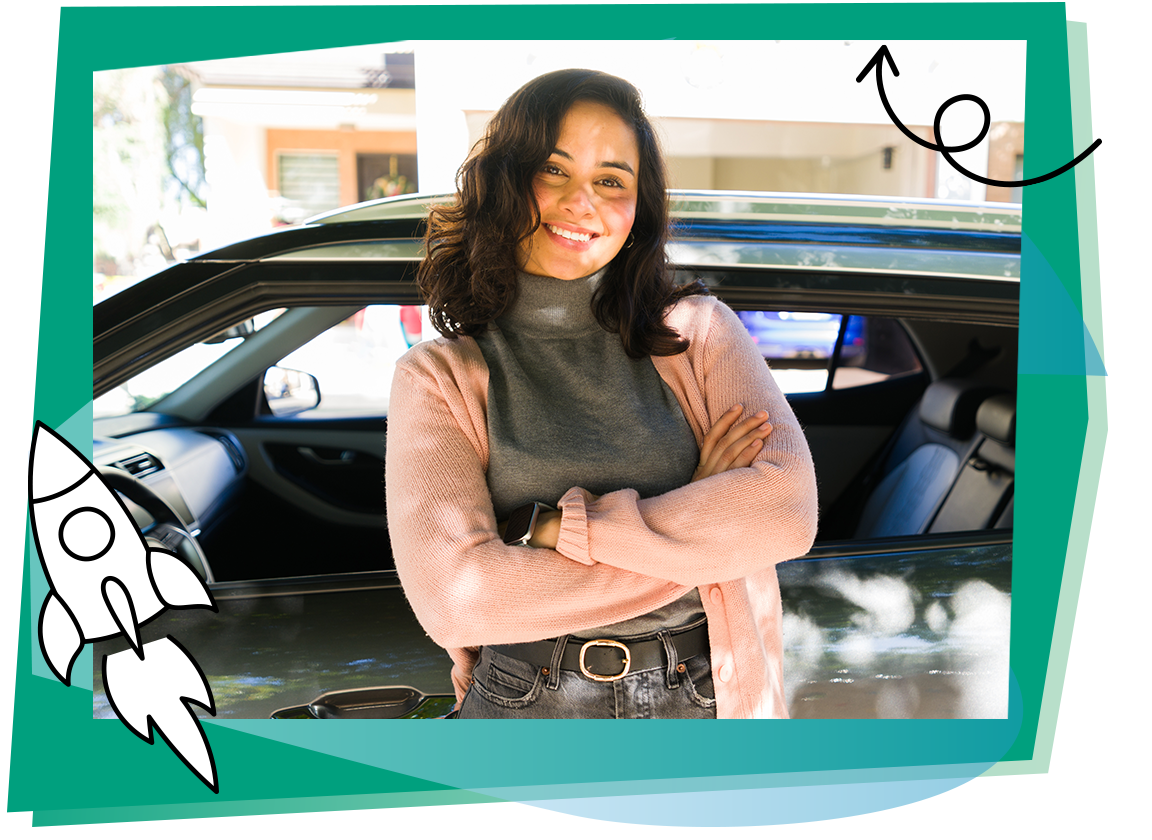a woman standing in front of an EV